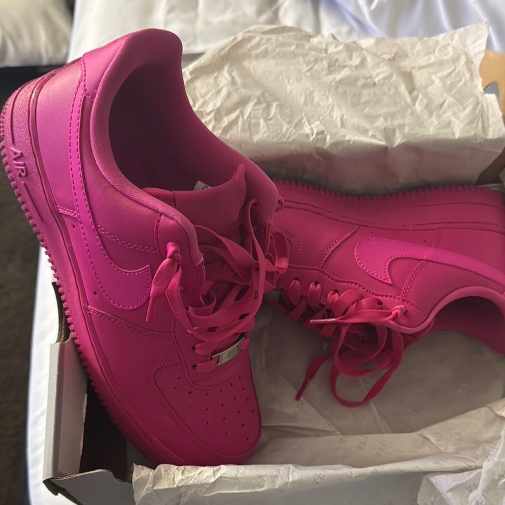 Nike Pink Mesh Sneakers with Streamlined Design